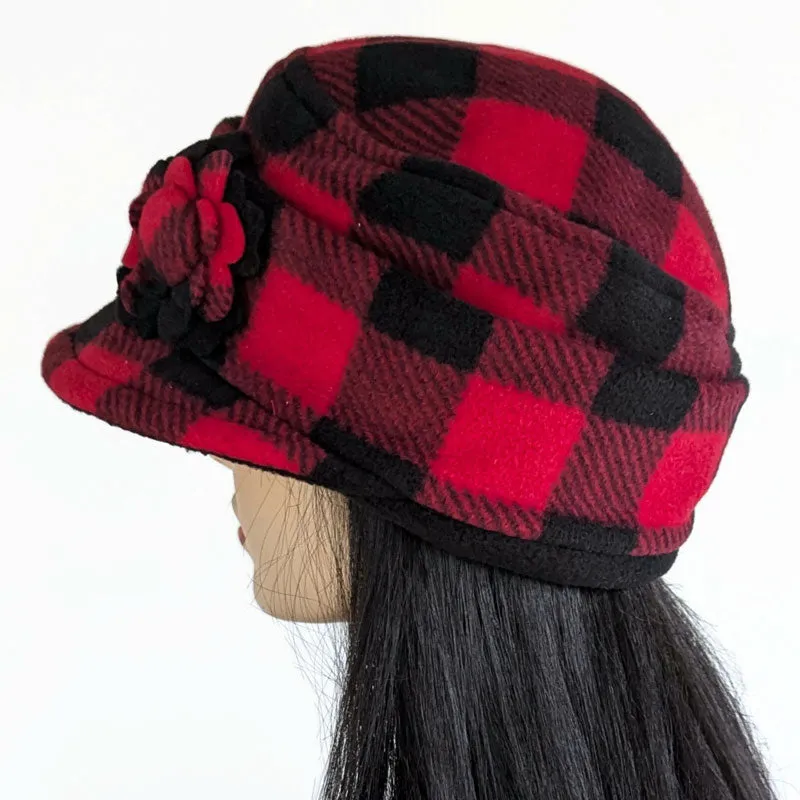 Fleece Fashion Cap with floral pin in popular plaid check, with fleece cuff and pin